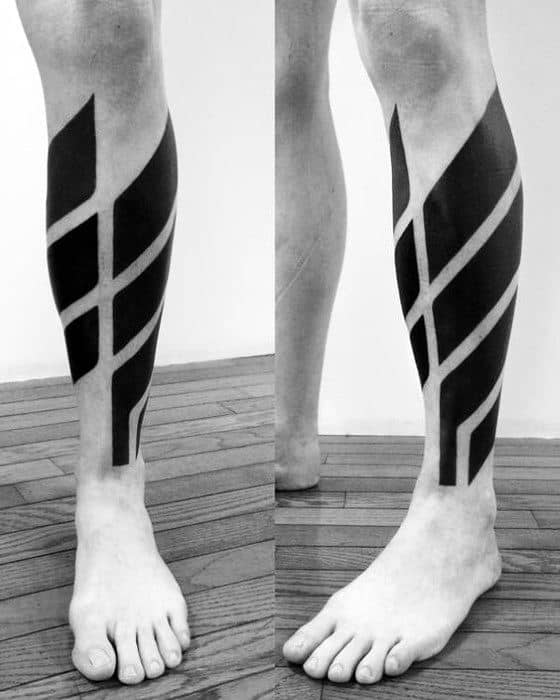 Manly All Black Negative Space Leg Tattoos For Guys