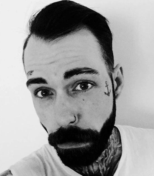 Manly Anchor Face Tattoo On Gentleman