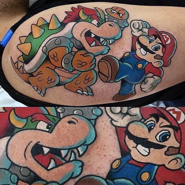 Colorful Bowser and Mario tattoo on a man's leg featuring bold outlines, vibrant shading, and a dynamic battle scene in a classic Mario style.