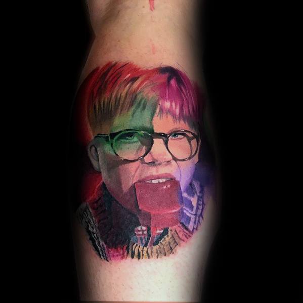 Realistic Christmas tattoo of Ralphie from *A Christmas Story*, featuring his iconic scene with a bar of soap in his mouth, capturing nostalgic holiday humor.