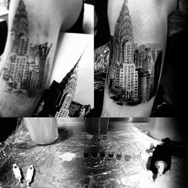 Black-and-grey Chrysler Building tattoo in progress, showcasing detailed shading and realism, with stencil and reference image for precision.