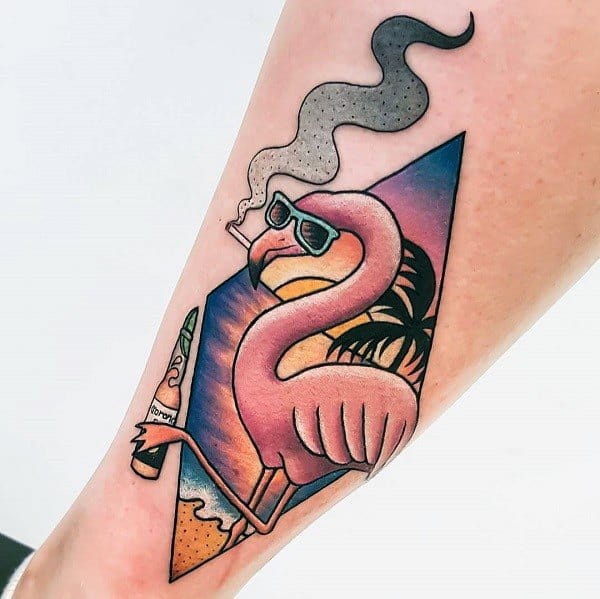 Playful flamingo tattoo with sunglasses, a beer bottle, and a smoking cigarette, set against a vibrant beach sunset for a quirky summer vibe.