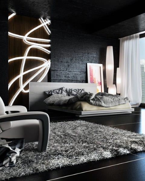 Modern bedroom with abstract lighting, gray rug, and floor-to-ceiling window.