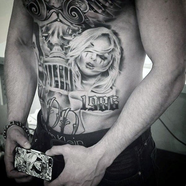 Manly Guys Chicano Stomach And Chest Tattoo