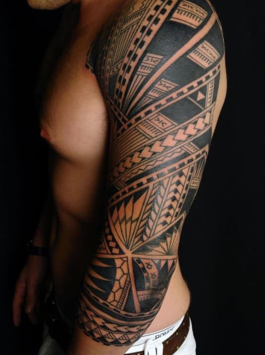Manly Half Tribal Sleeve Tattoo Design On Man