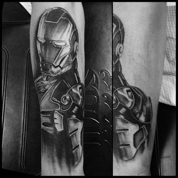 Iron Man tattoo in black and gray, showcasing a highly detailed portrait of his helmet and upper body with dramatic shading, emphasizing the metallic texture of his armor.