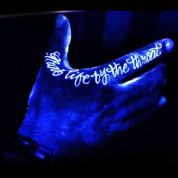 Manly Lettering Glow In The Dark Hand Tattoo With Grab Life By The Throat Wording