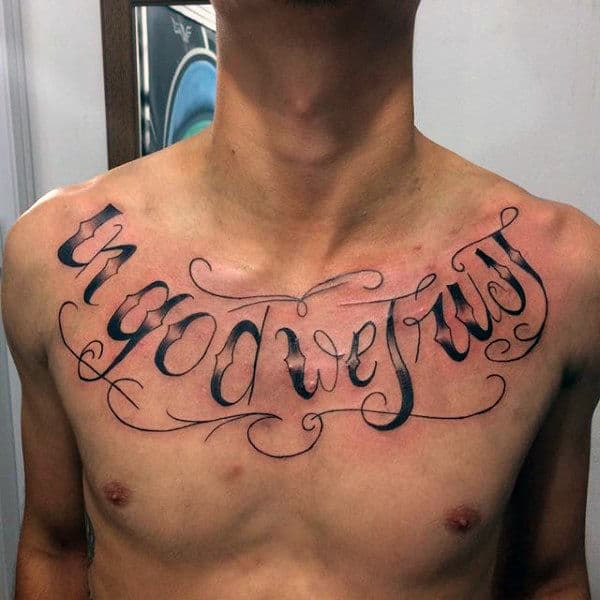 Manly Lettering Male In God We Trust Word Upper Chest Tattoo Design Ideas