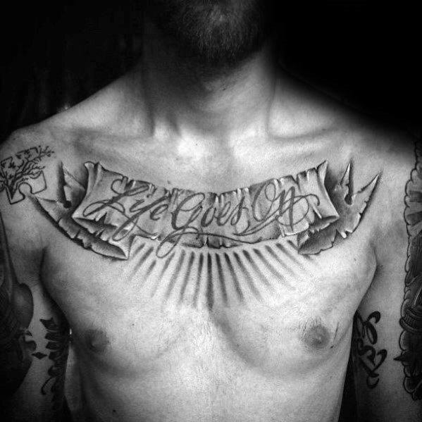 Manly Life Goes On Banner Chest Tattoo Design Ideas For Men