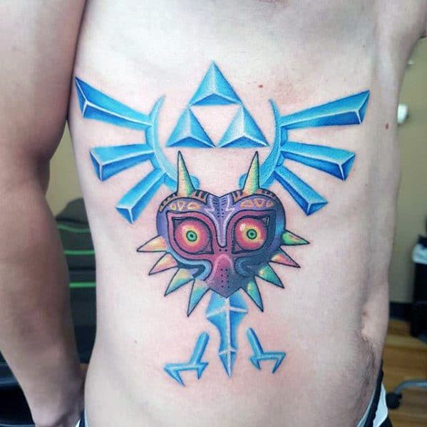 Manly Majoras Mask Tattoo Design Ideas For Men On Rib Cage Side