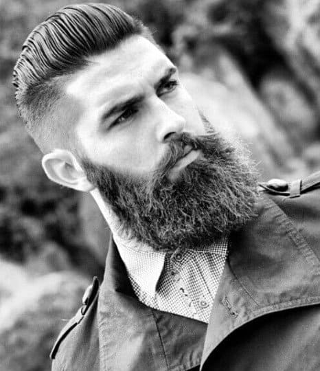 Man with a slicked-back undercut and full beard