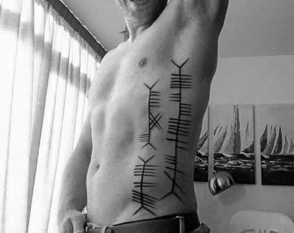 Manly Ogham Tattoo Design Ideas For Men Rib Cage Side Of Body