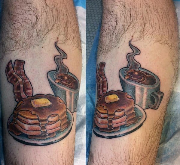 Realistic breakfast tattoo featuring pancakes with syrup and butter, crispy bacon, and a steaming cup of coffee for a classic morning vibe.