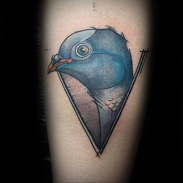 Modern pigeon tattoo with a geometric triangle frame, featuring soft blue shading and fine line details for a sleek, artistic look.