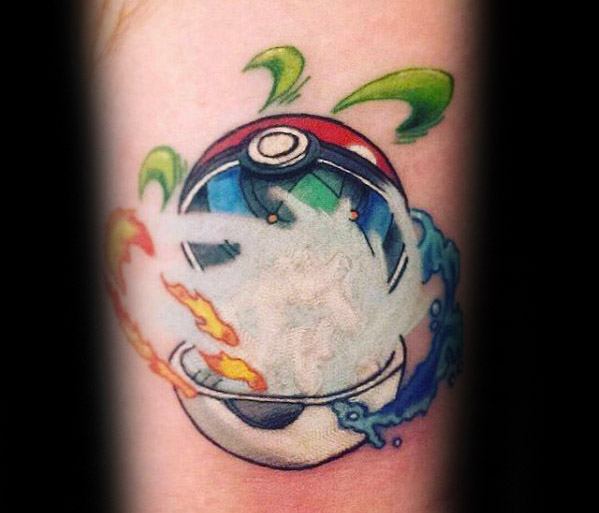 Open Pokeball tattoo releasing elements of fire, water, grass, and smoke in vibrant colors, symbolizing all Pokémon types in motion.