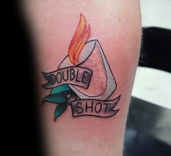 Colorful shot glass tattoo with a flaming drink, a "Double Shot" banner, and leaf accents, creating a bold and dynamic design.