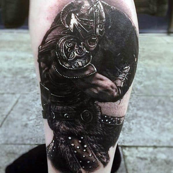 Vivid Skyrim Viking warrior tattoo on a person's leg