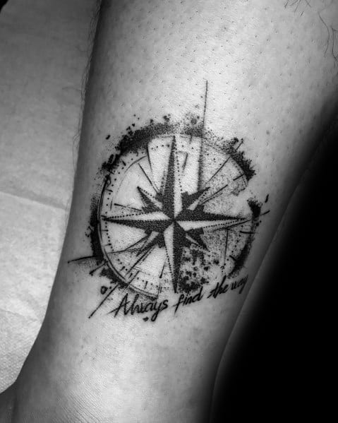 Compass tattoo with a watercolor splash effect and the phrase "Always find the way," symbolizing guidance, resilience, and personal direction.