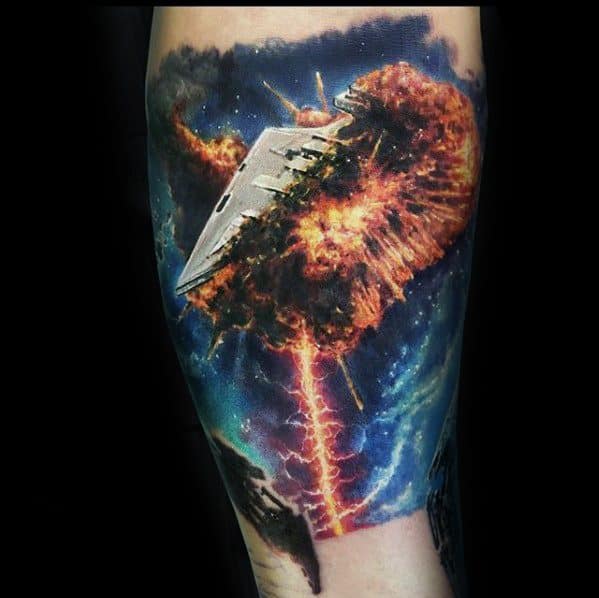 Vibrant Star Destroyer tattoo showing a fiery explosion in space with bold colors, lightning, and dynamic galactic detail.