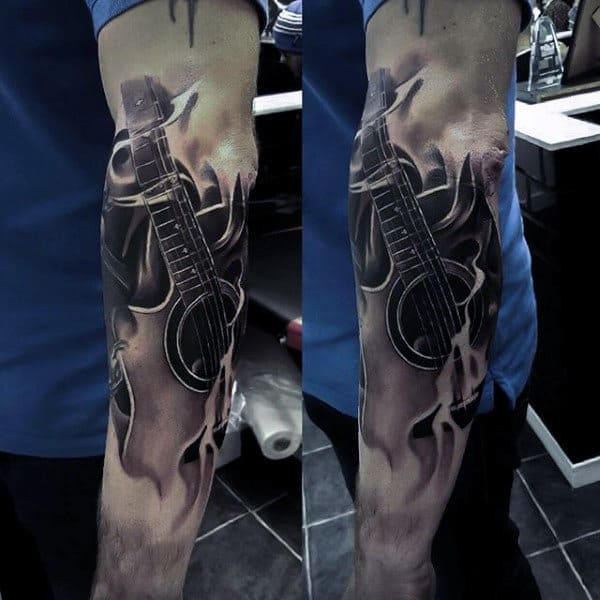 Manly Tattoo Of Smoky Musical Tool Tattoo Male Forearms