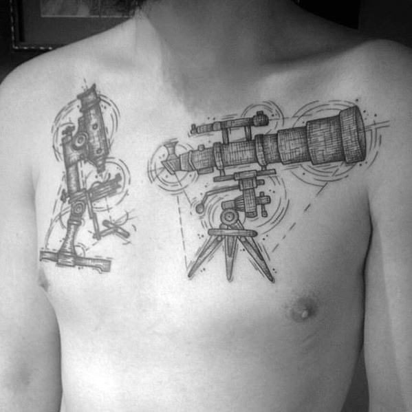 Black and white telescope tattoos elegantly adorn a person’s chest