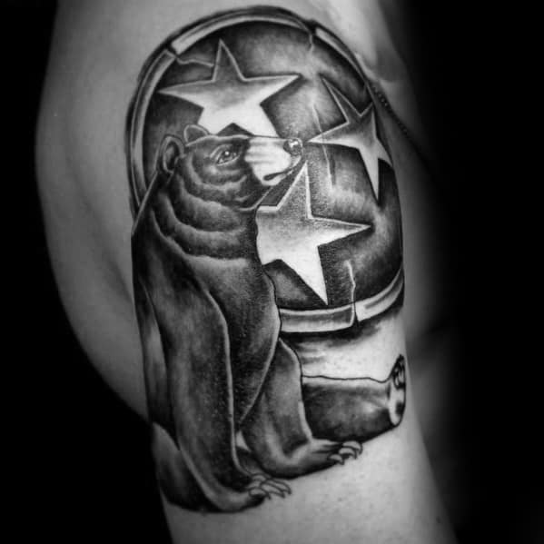 Black and grey Tennessee three-star emblem tattoo with a detailed bear, symbolizing strength, nature, and state pride in a bold design.