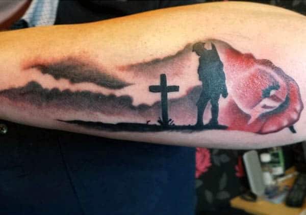 Manly Watercolor Poppy Solider Over Cross Grave Tattoo On Outer Forearm