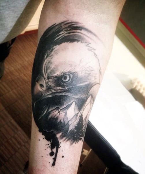 Mans Horrific Black Bald Eagle Tattoo On Forearms