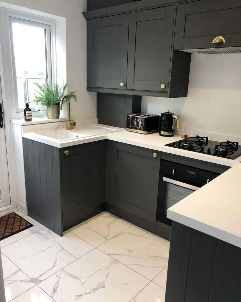 gray kitchen cabinets marble tile flooring