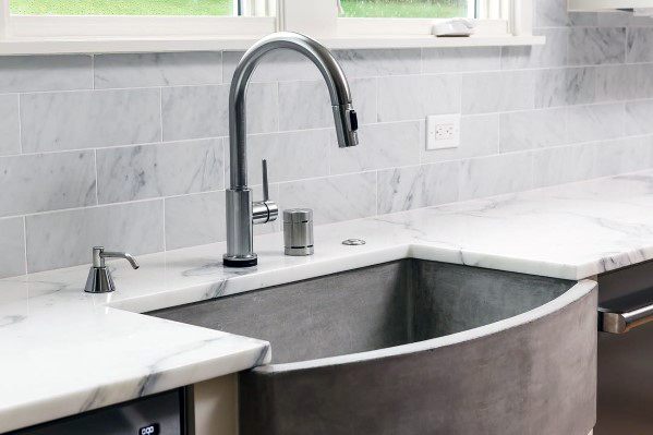 Modern kitchen with marble subway tile backsplash