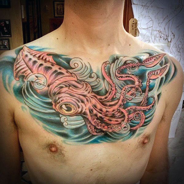 Marine Themed Squid Tattoo For Men On Upper Chest