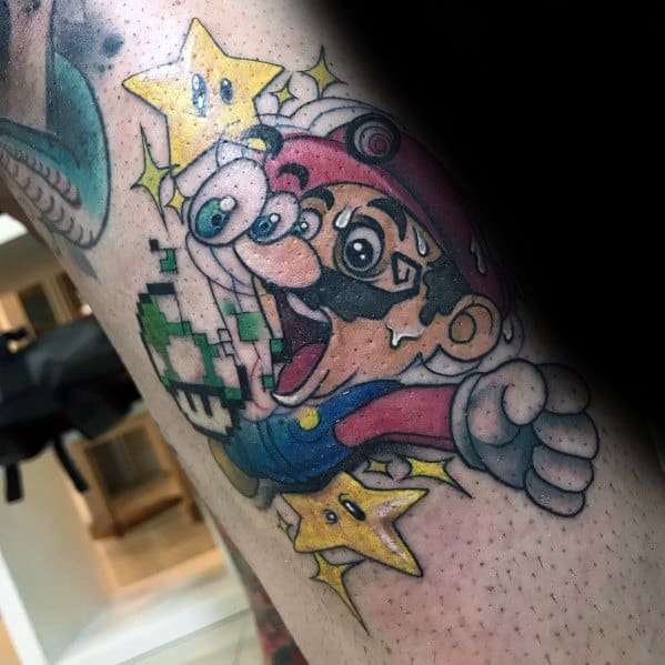 Glitch-style *Super Mario* tattoo featuring Mario with pixelated effects, Super Stars, and vibrant shading for a bold, modern gaming-inspired design.
