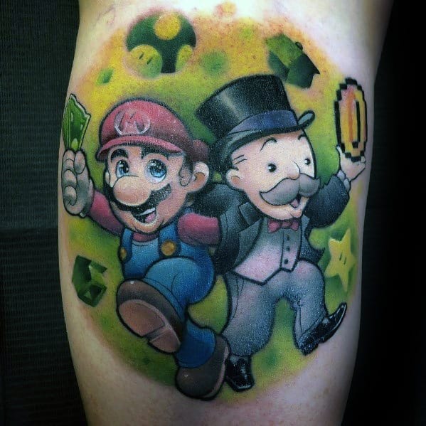 Creative *Super Mario* and *Monopoly* mashup tattoo featuring Mario and Mr. Monopoly jumping together with money, coins, and power-ups.