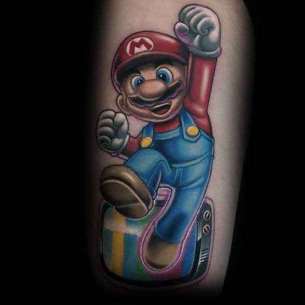 Vibrant *Super Mario* tattoo featuring Mario jumping out of a retro TV screen with colorful static, blending nostalgia with a dynamic 3D effect.