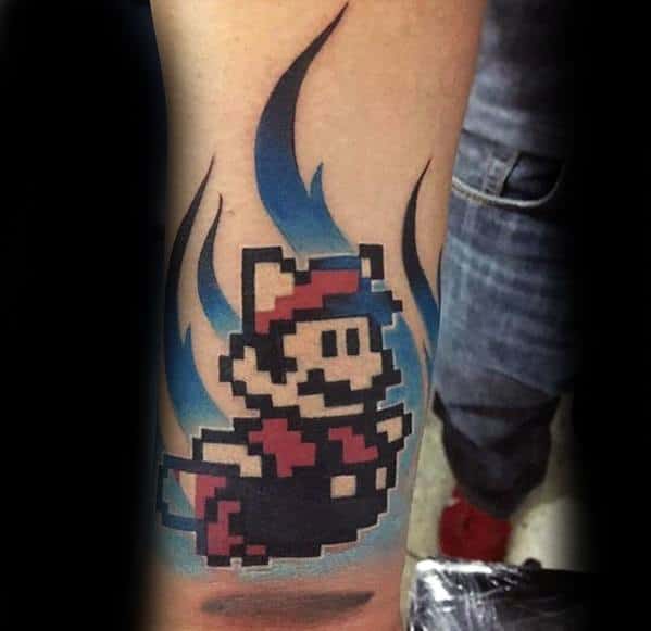 Mario With Blue Flames Mens Pixel Tattoo Design Inspiration On Inner Forearm