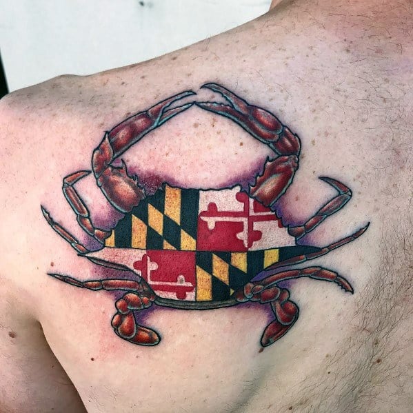 Maryland flag crab tattoo on the upper back, featuring bold colors and intricate details to represent state pride and coastal heritage.