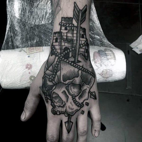 Masculine Arrow Through Skull Castle Hand Tattoos For Males