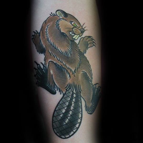 Traditional-style beaver tattoo with bold outlines, fierce expression, sharp claws, and a textured tail in classic brown tones.