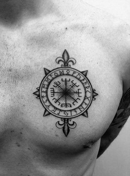 Vegvísir tattoo on the chest, a Nordic compass symbol with intricate detailing, representing guidance, protection, and strength in life's journey.