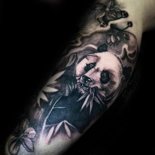 Masculine Forearm Panda Bear Chewing Plant Tattoo For Men