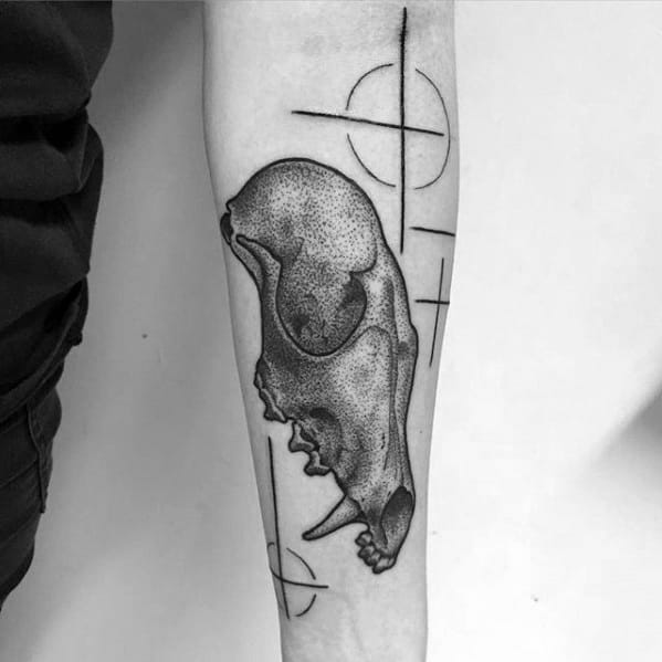 Dotwork fox skull tattoo on the forearm with abstract geometric lines and circles for a modern minimalist twist.
