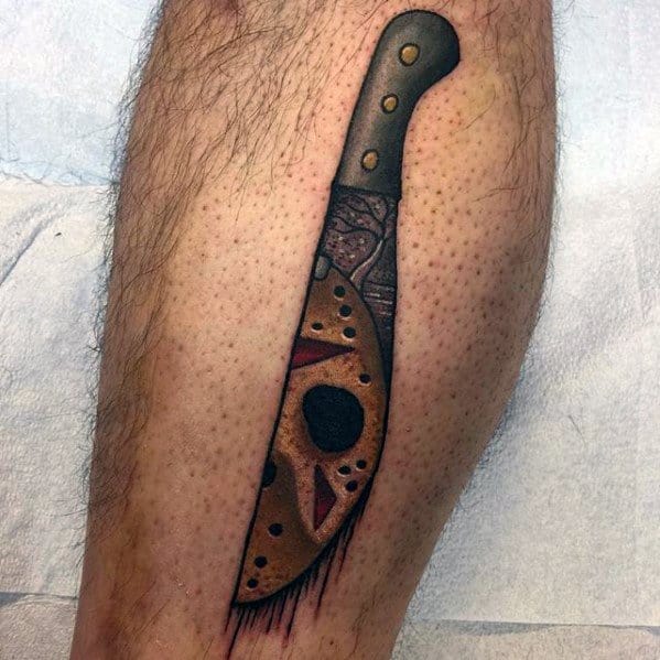 Masculine Jason Mask Knife Side Of Leg Tattoos For Men