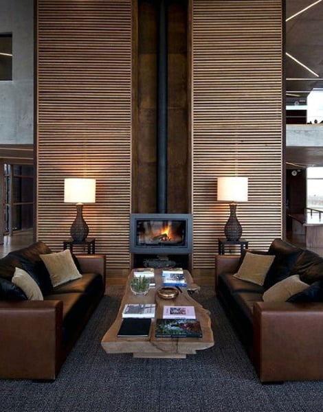 unique wall luxury living room two brown leather sofas fireplace 