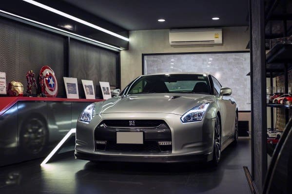 masculine mens garage with marvel decorations sports car 