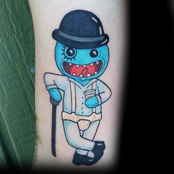 Tattoo of Mr. Meeseeks from Rick and Morty dressed as Alex from A Clockwork Orange, wearing a bowler hat and holding a cane.