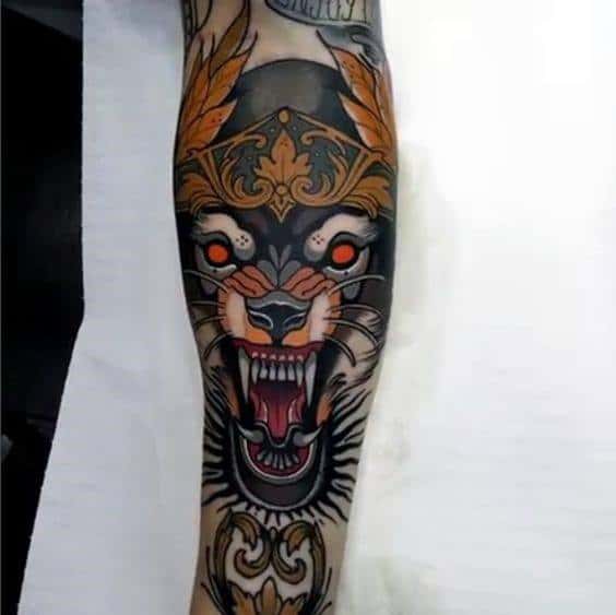 Neo-traditional tattoo of a snarling wolf with fiery red eyes, ornate golden patterns, bold shading, and intricate detailing for a regal look.