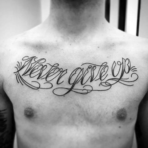 Masculine Never Give Up Tattoos For Men On Upper Chest