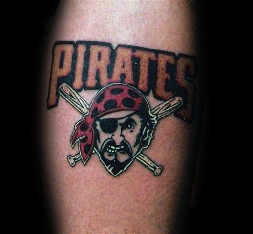Bold Pittsburgh Pirates tattoo featuring the team name above a fierce pirate face with crossed bats and a red bandana.