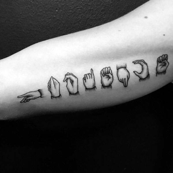 black ink tattoo of hands spelling out a word in American Sign Language, arranged in a neat row along the forearm with fine line detailing