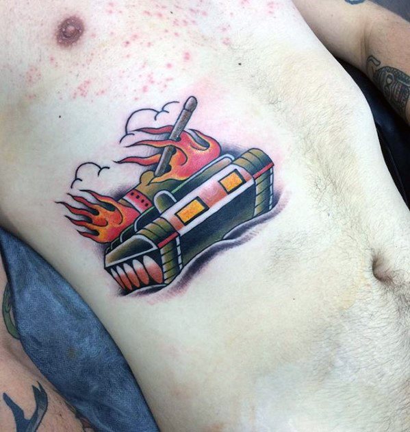 Neo-traditional tank tattoo on the torso, with bold outlines, bright flames, and a stylized design featuring strong red and orange tones.
